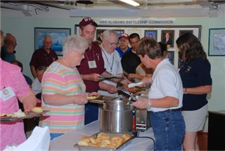 Click Photo (61) to Enlarge.  L-Back: Pete Wallace; Service Table: L-R Cheryl, Perrin, Lee Perrin, Johnn Sees; Back (VFP-62 hat) Ernie Halley
